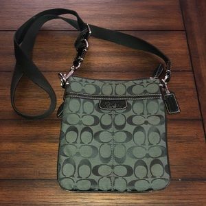Green cross-body Coach bag